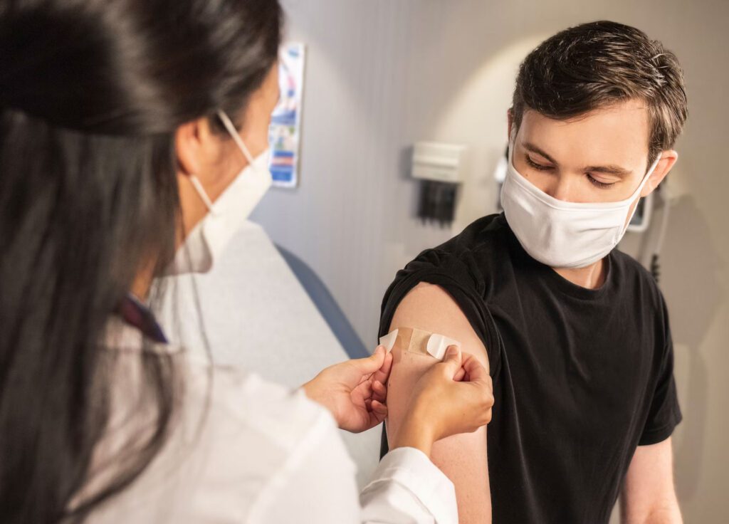 a man receiving a vaccine