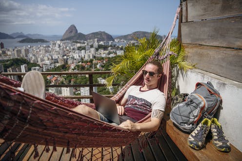 Lounging on a hammock and working on computer