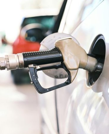 Gas pump inserted into a car.