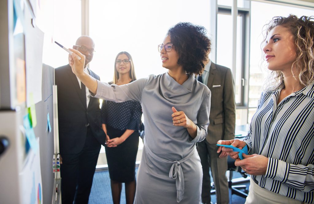 Woman leading a discussion.