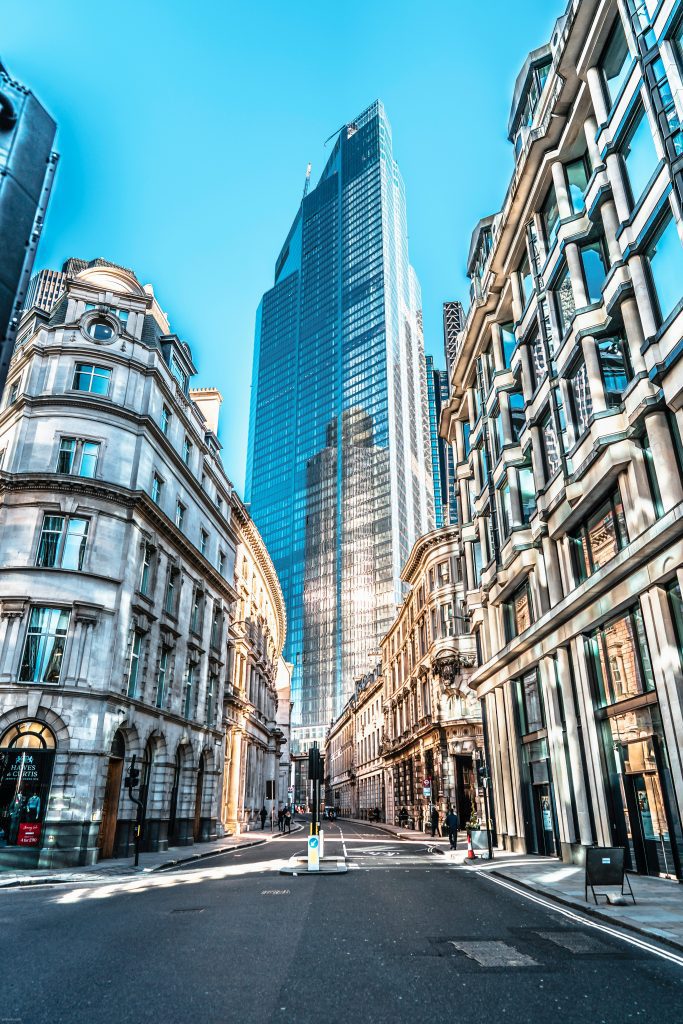 Old and new buildings in the business street.